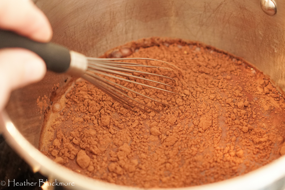 whisking cocoa powder