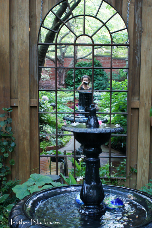 Wall mounted garden mirror