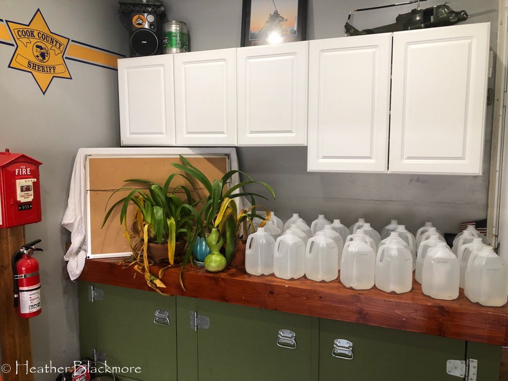 water jugs on workbench