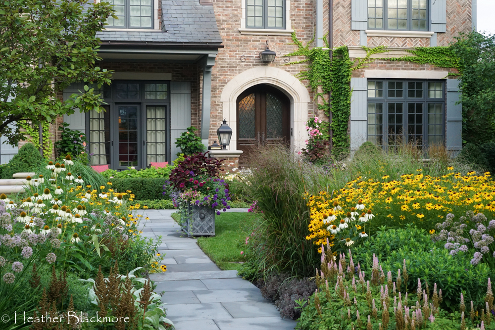 Bluestone walkway through front yard garden