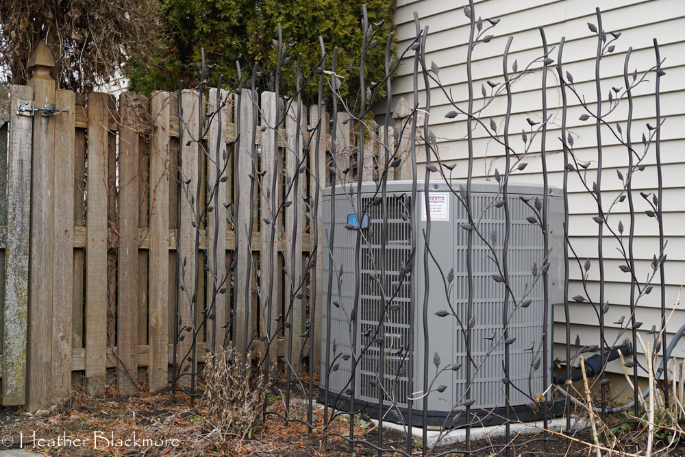 Trellis around air conditioner