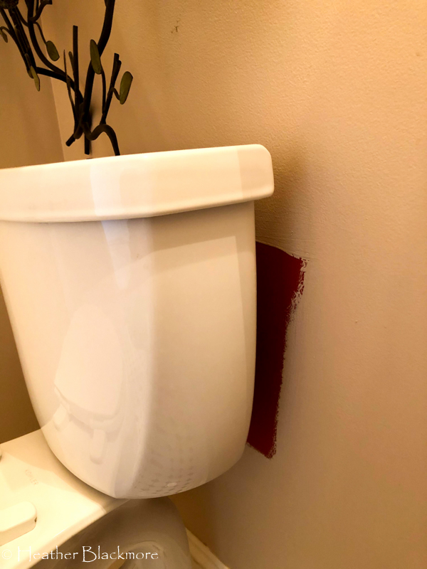 red splotch behind toilet