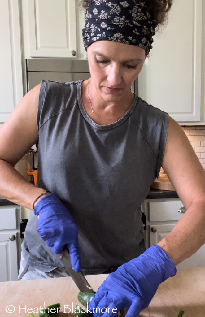chopping jalapeno peppers
