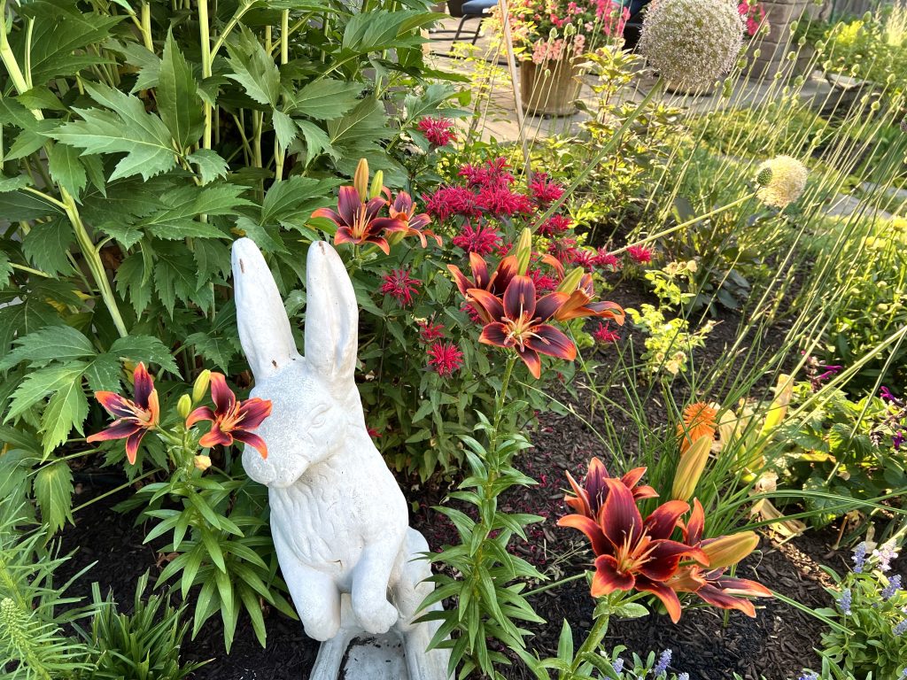 Lilies and rabbit statue